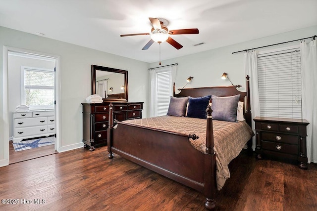 bedroom featuring ceiling fan and dark wood-type flooring