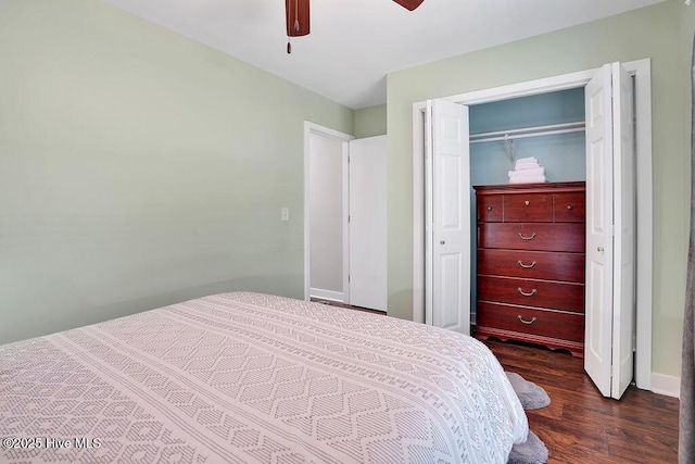 bedroom with dark wood-type flooring and ceiling fan