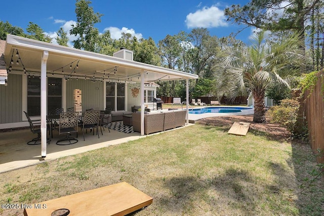 view of yard featuring an outdoor living space and a patio