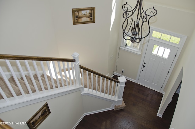 foyer with dark wood-type flooring