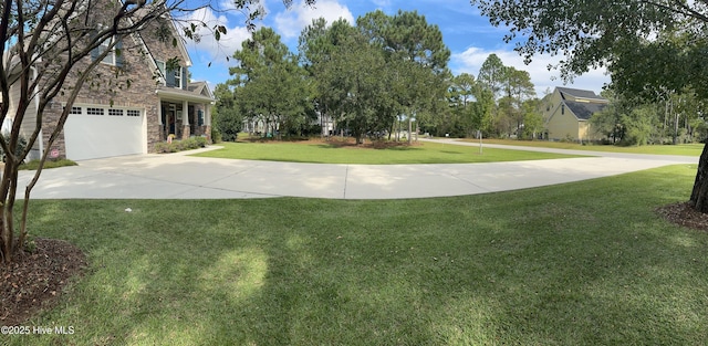 view of yard with a garage