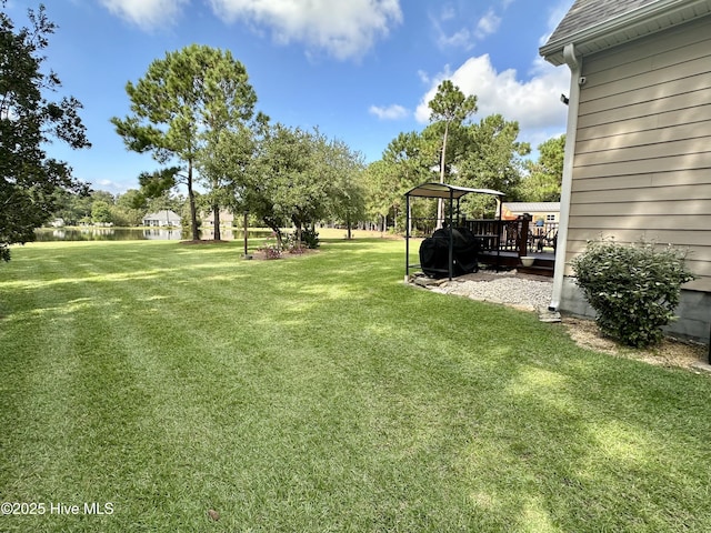 view of yard featuring a deck