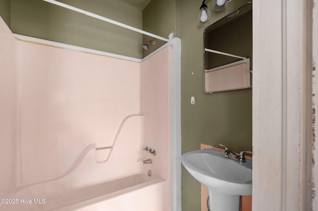 bathroom featuring sink and shower / bathtub combination