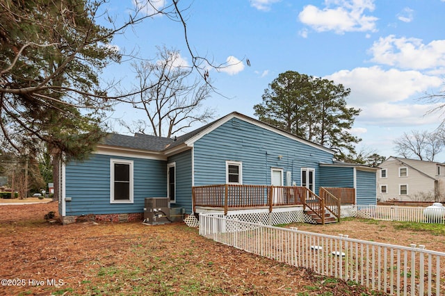 view of front of house with a wooden deck