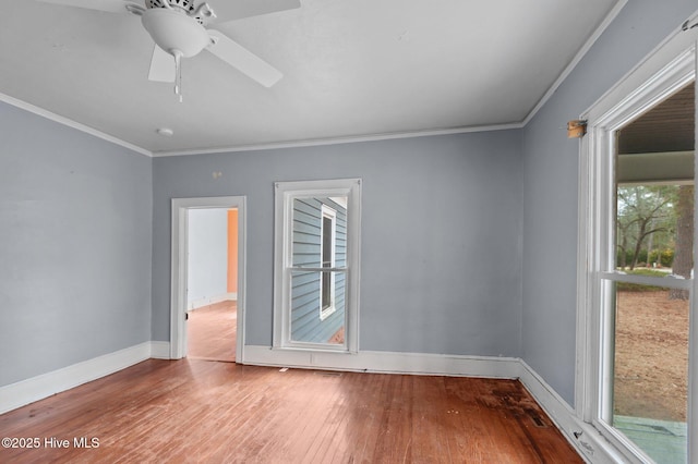 unfurnished room with crown molding, hardwood / wood-style flooring, and ceiling fan