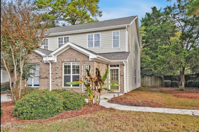 view of front of house featuring a front lawn