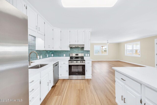 unfurnished room featuring ceiling fan and light wood-type flooring