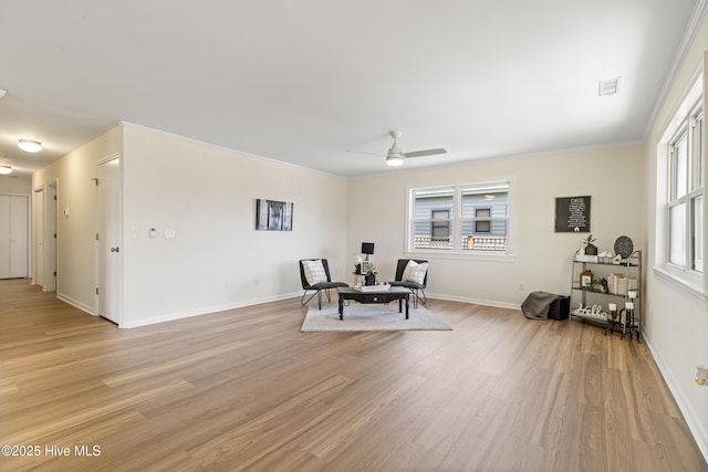 kitchen with tasteful backsplash, appliances with stainless steel finishes, a sink, extractor fan, and light wood finished floors