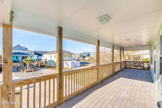 wooden terrace with covered porch