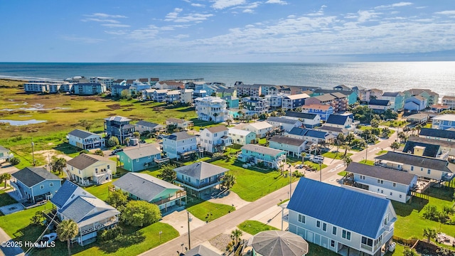 bird's eye view with a residential view and a water view