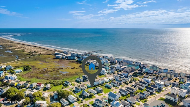 bird's eye view featuring a residential view and a water view