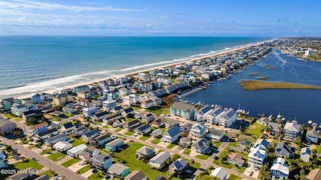 bird's eye view featuring a residential view and a water view
