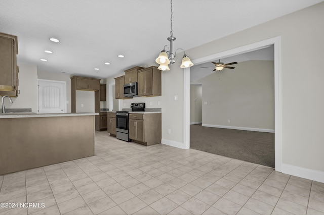 kitchen featuring light carpet, sink, decorative light fixtures, stainless steel appliances, and ceiling fan with notable chandelier