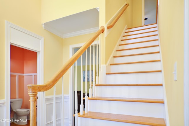 stairway with crown molding