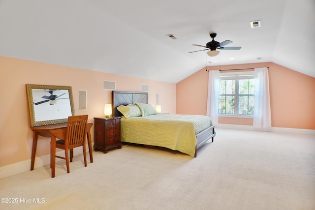 carpeted bedroom featuring ceiling fan and vaulted ceiling