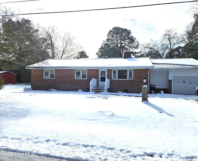 single story home with a garage