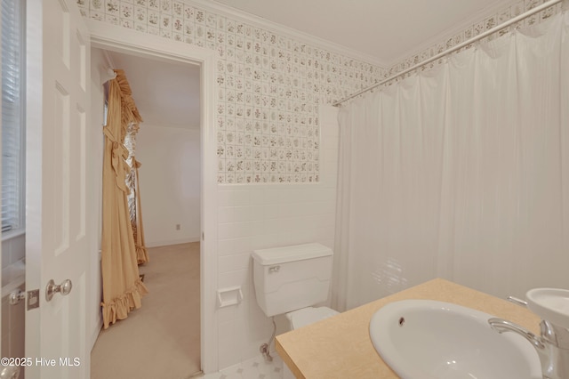 bathroom with vanity, toilet, crown molding, and a shower with curtain