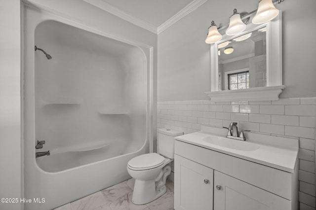 full bathroom with toilet, shower / bathing tub combination, tile walls, ornamental molding, and vanity