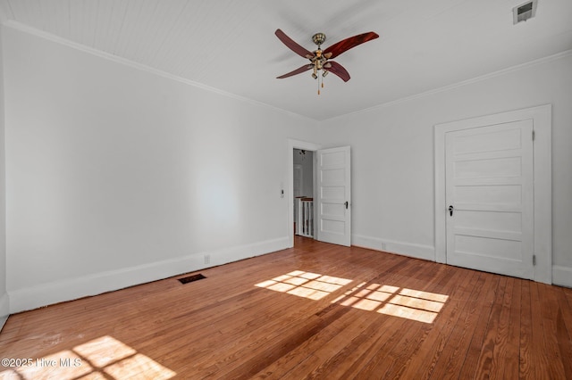 unfurnished bedroom featuring crown molding, hardwood / wood-style floors, and ceiling fan