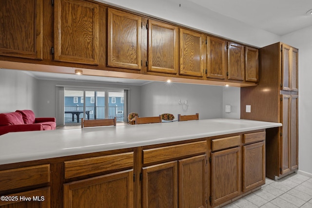 kitchen with light tile patterned floors