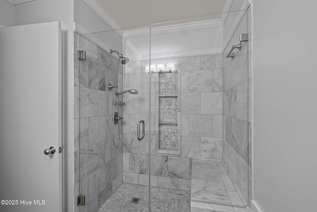 bathroom featuring ornamental molding and walk in shower