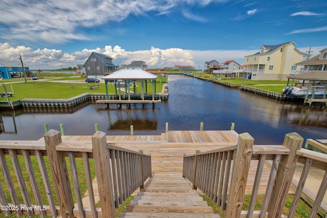 dock area with a water view and a gazebo