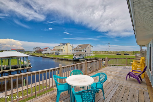 wooden deck with a water view