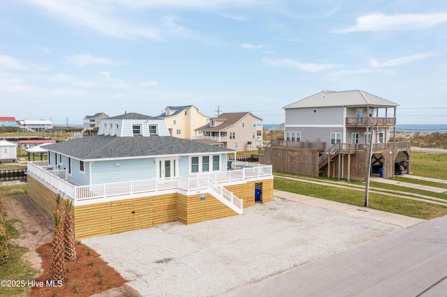 view of front of home with a balcony