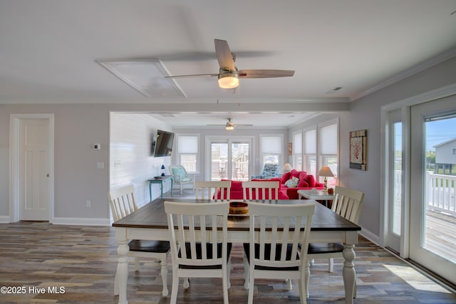 dining room with wood-type flooring and ornamental molding