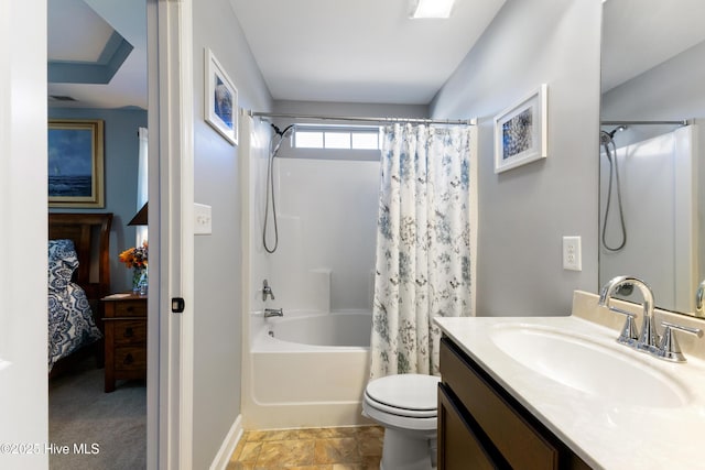 full bathroom featuring vanity, shower / bathtub combination with curtain, and toilet