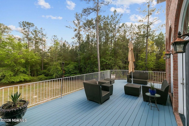 wooden deck with an outdoor hangout area