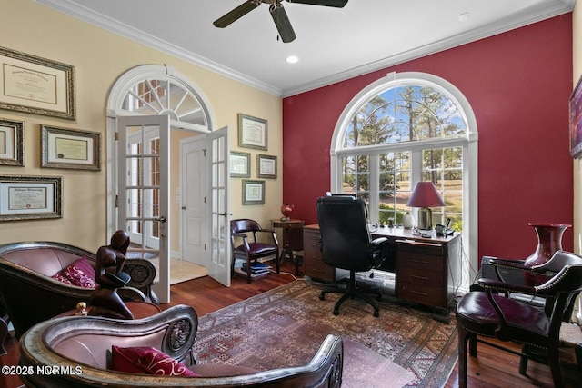 office with a ceiling fan, ornamental molding, wood finished floors, and french doors