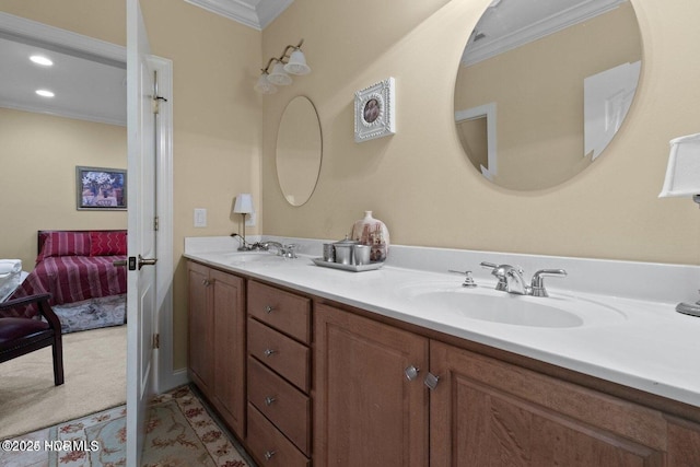 full bath with double vanity, ornamental molding, a sink, and recessed lighting