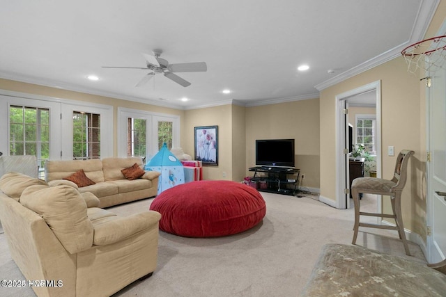 living room with light carpet, recessed lighting, baseboards, and crown molding