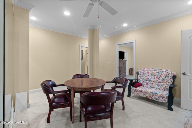 dining space with light carpet, baseboards, ornamental molding, and recessed lighting