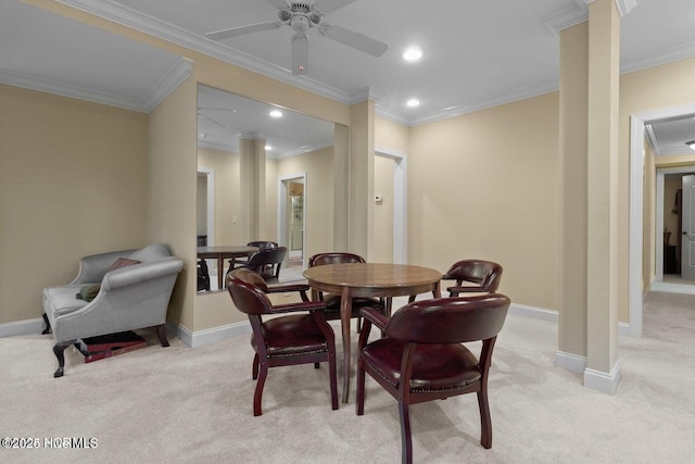 dining space featuring light carpet, baseboards, crown molding, and recessed lighting