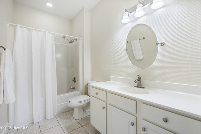 full bathroom featuring toilet, vanity, tile patterned floors, and shower / tub combo with curtain