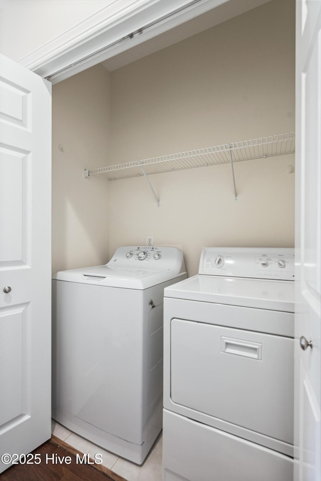 laundry area with washer and dryer