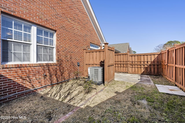 view of yard with central AC