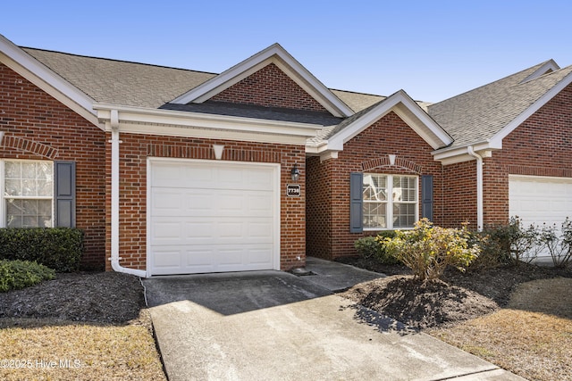 single story home with a garage