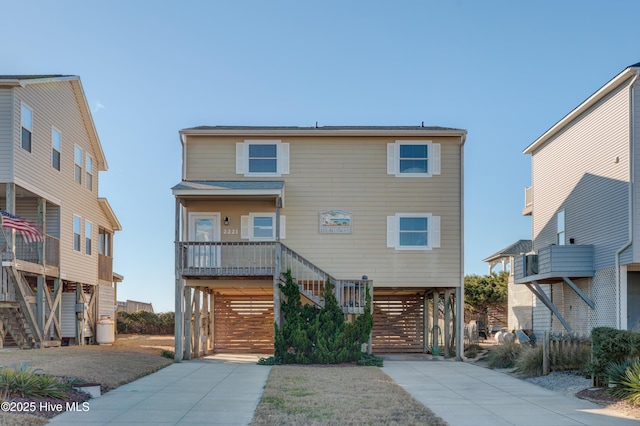 view of front of property featuring a carport