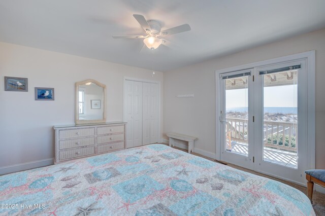 bedroom with light carpet, access to outside, and ceiling fan