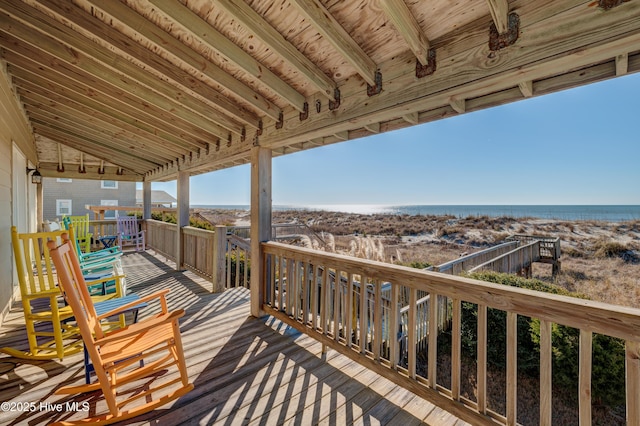 deck featuring a water view