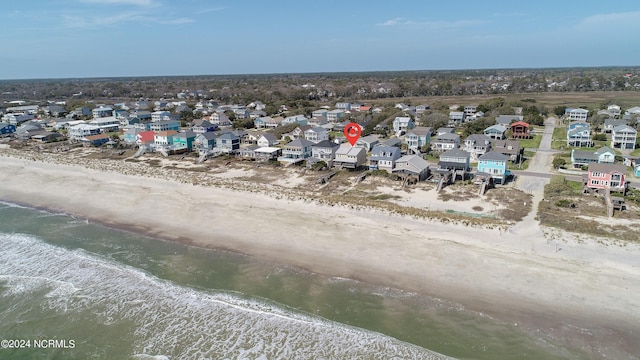 aerial view with a beach view and a water view