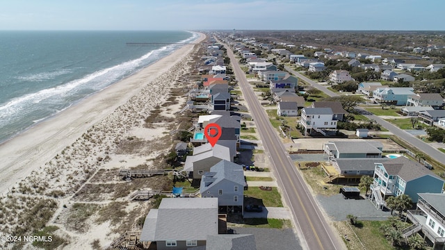 aerial view with a view of the beach and a water view