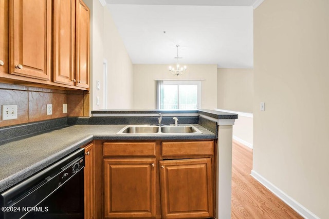 kitchen featuring tasteful backsplash, black dishwasher, sink, light hardwood / wood-style floors, and kitchen peninsula