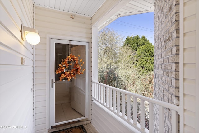 doorway to property featuring a balcony