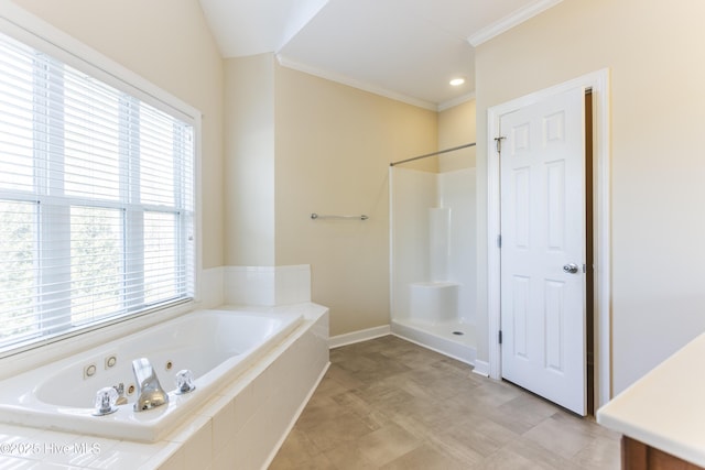 bathroom with crown molding and independent shower and bath