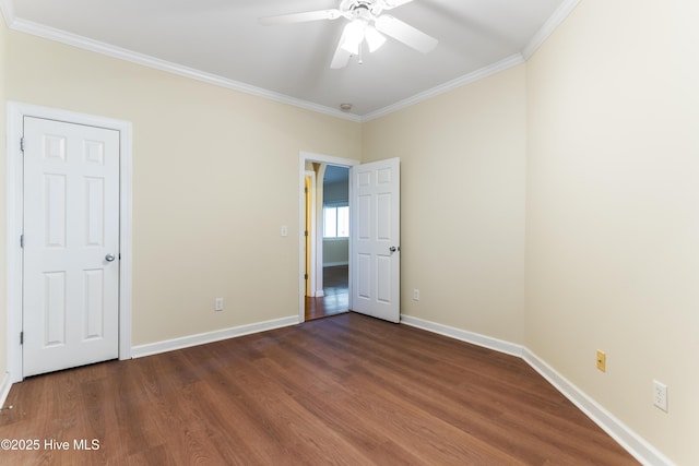 unfurnished bedroom featuring ceiling fan, ornamental molding, and dark hardwood / wood-style floors