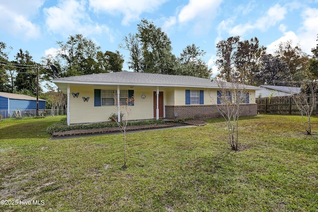 single story home featuring a front yard